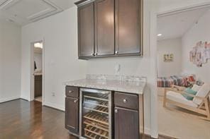 3937 Law St, Houston, TX 77005 - indoor dry bar with beverage cooler and dark wood-style flooring