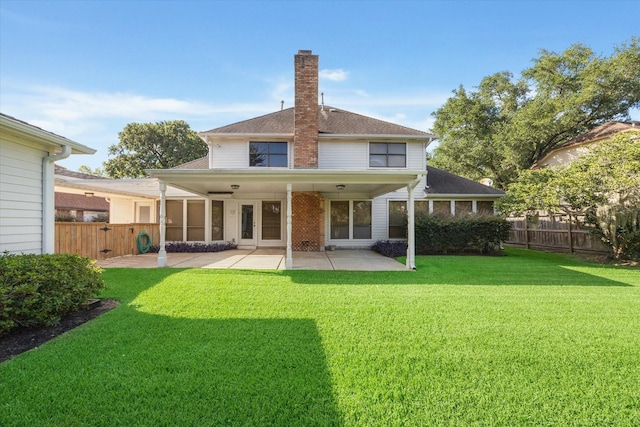 15718 Craighurst Dr, Houston, TX 77059 - back of house featuring a patio area, a chimney, brick siding, and a shingled roof