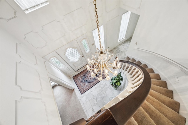 15718 Craighurst Dr, Houston, TX 77059 - stairway with a high ceiling and a chandelier
