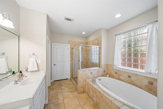 18882 Mystic Pt, Montgomery, TX 77356 - full bathroom with a shower stall, a bath, vanity, recessed lighting, and tile patterned floors