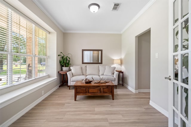 18882 Mystic Pt, Montgomery, TX 77356 - living room featuring crown molding and light wood-type flooring