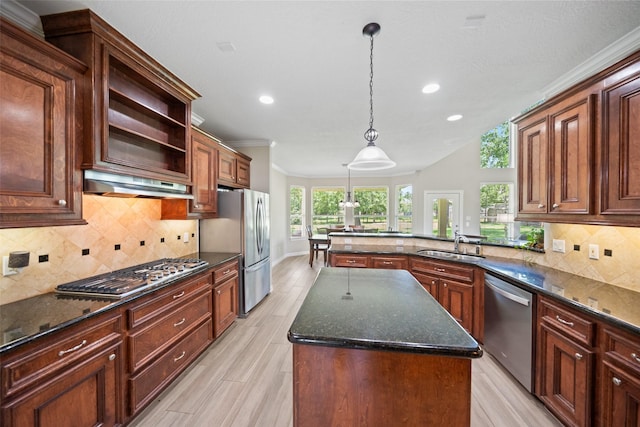 18882 Mystic Pt, Montgomery, TX 77356 - kitchen with appliances with stainless steel finishes, recessed lighting, a kitchen island, open shelves, and under cabinet range hood