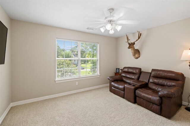 18882 Mystic Pt, Montgomery, TX 77356 - living area featuring carpet floors and a ceiling fan