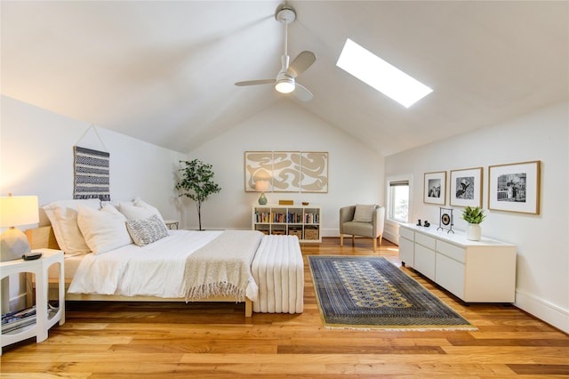 1121 Lashbrook Dr, Houston, TX 77077 - bedroom with a skylight, lofted ceiling, ceiling fan, and light wood-type flooring