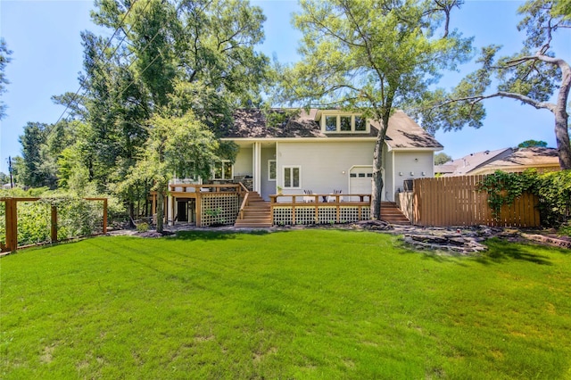 1121 Lashbrook Dr, Houston, TX 77077 - back of property featuring stairs, a deck, and a fenced backyard