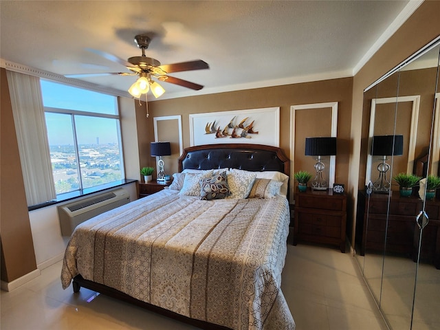 7510 Hornwood Dr Unit 1606, Houston, TX 77036 - bedroom featuring a ceiling fan, light tile patterned flooring, and an AC wall unit