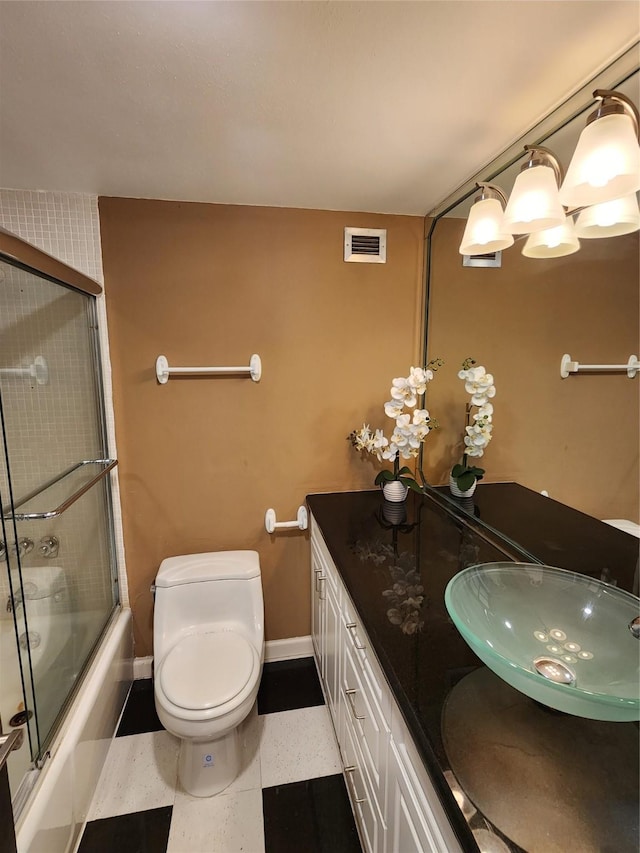 7510 Hornwood Dr Unit 1606, Houston, TX 77036 - full bathroom featuring vanity and combined bath / shower with glass door