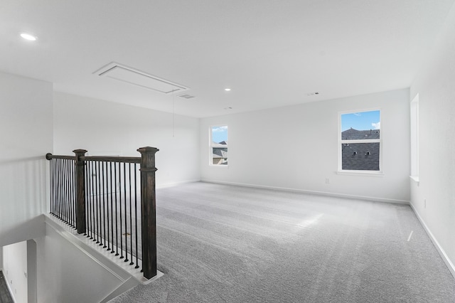 1127 Buffalo Run, Tomball, TX 77375 - spare room with attic access, carpet floors, and recessed lighting