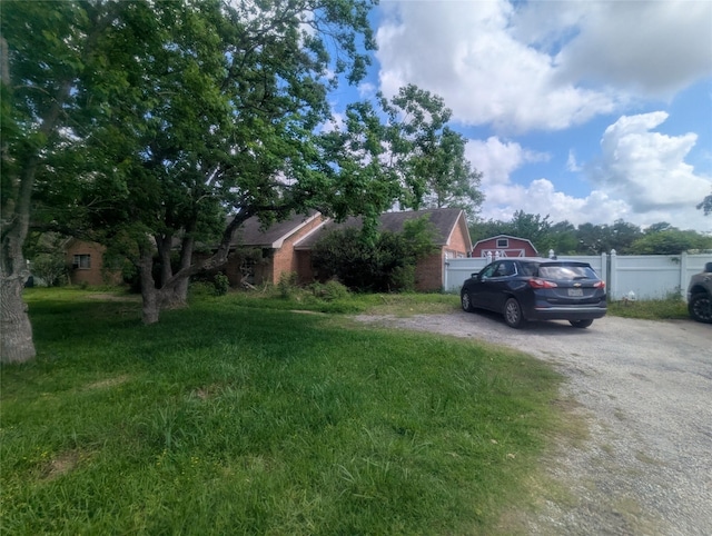 11029 Fm 1764, Santa Fe, TX 77510 - view of yard with gravel driveway