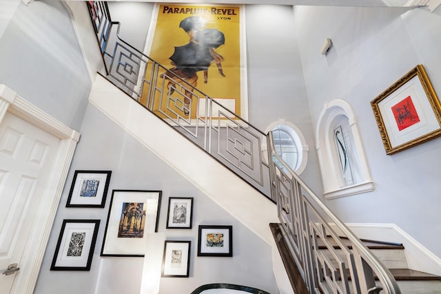38 Hackberry Ln, Houston, TX 77027 - stairway featuring a towering ceiling