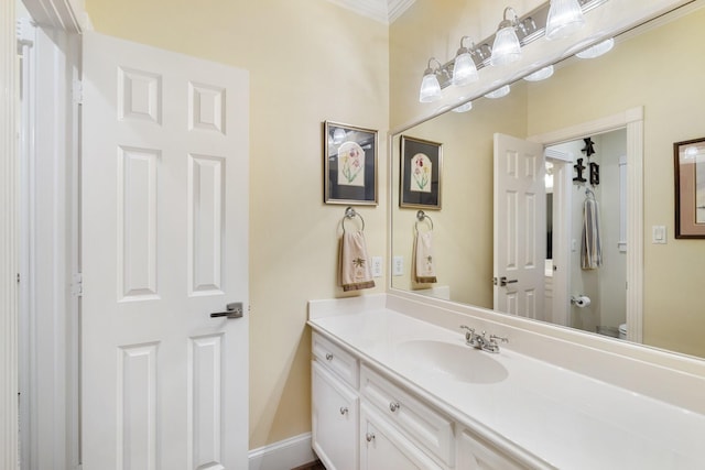 38 Hackberry Ln, Houston, TX 77027 - bathroom with vanity and ornamental molding