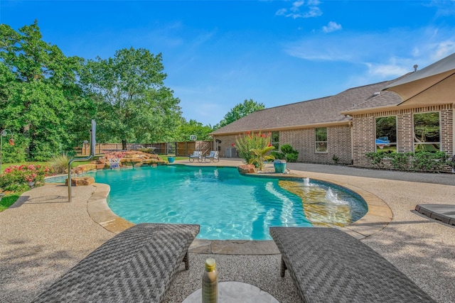 17817 Ranch House Rd, College Station, TX 77845 - view of swimming pool featuring a patio area and a fenced backyard