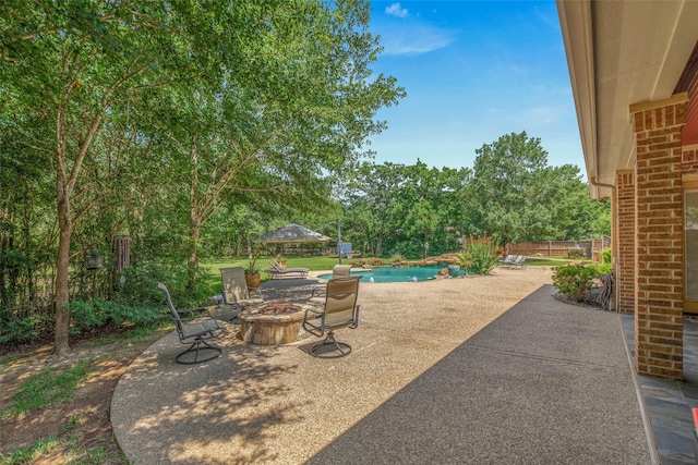17817 Ranch House Rd, College Station, TX 77845 - view of patio / terrace featuring an outdoor fire pit