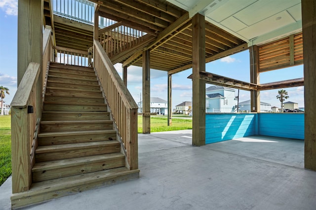 210 Galveston St, Crystal Beach, TX 77650 - view of patio with stairs and a residential view