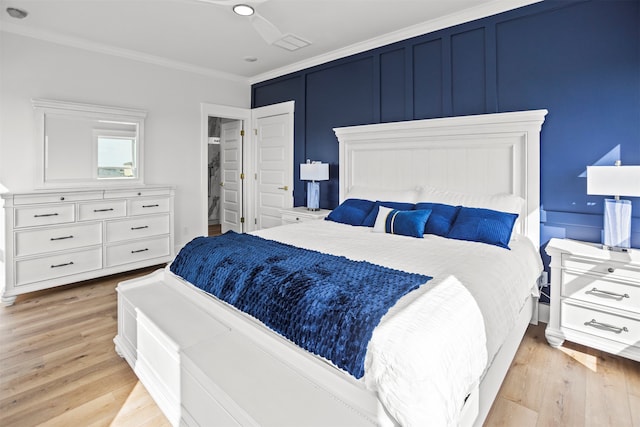 210 Galveston St, Crystal Beach, TX 77650 - bedroom featuring ornamental molding and light wood-style floors