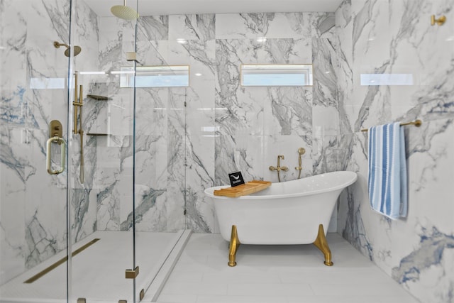 210 Galveston St, Crystal Beach, TX 77650 - bathroom with a marble finish shower and a freestanding tub