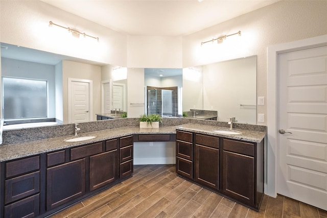 21018 Cypress Creek View Ct, Humble, TX 77338 - full bath featuring vanity, a shower stall, and wood finished floors