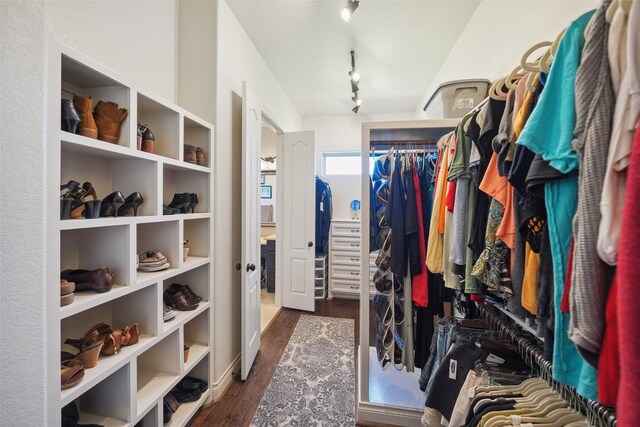 5924 Oak Leaf Ct, Conroe, TX 77304 - walk in closet with dark wood-type flooring
