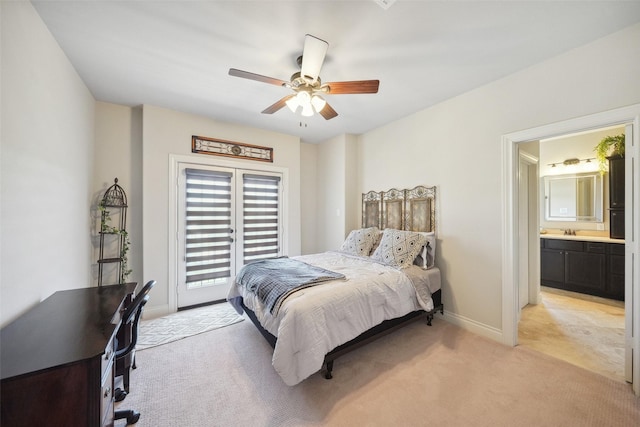 5924 Oak Leaf Ct, Conroe, TX 77304 - bedroom with light colored carpet, access to exterior, ensuite bath, and ceiling fan