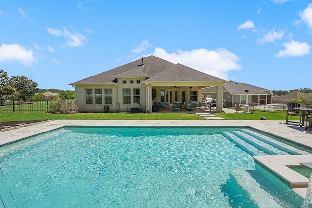 5924 Oak Leaf Ct, Conroe, TX 77304 - view of pool with ceiling fan, a patio, a fenced backyard, and a jacuzzi