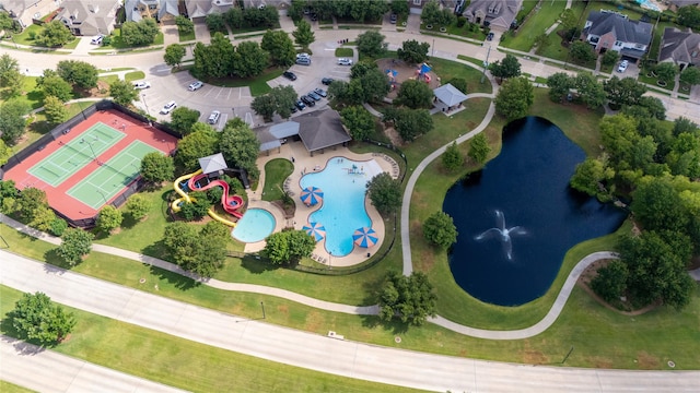 28423 Tanner Crossing Ln, Katy, TX 77494 - aerial view of residential area featuring a nearby body of water and a pool area