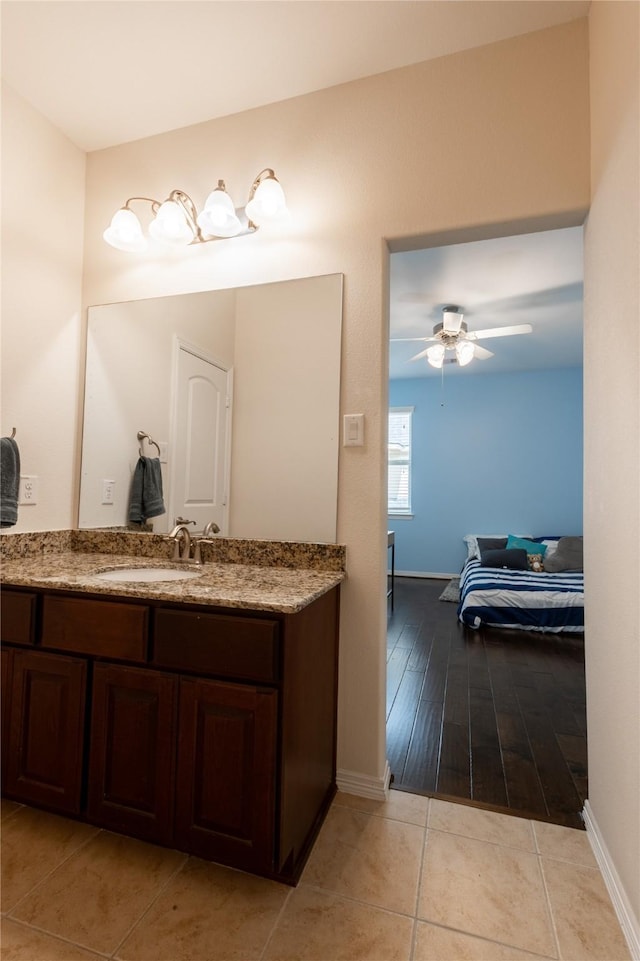 28423 Tanner Crossing Ln, Katy, TX 77494 - bathroom with vanity, a ceiling fan, and tile patterned flooring