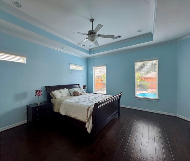 28423 Tanner Crossing Ln, Katy, TX 77494 - bedroom with a raised ceiling, dark wood finished floors, ornamental molding, and a ceiling fan