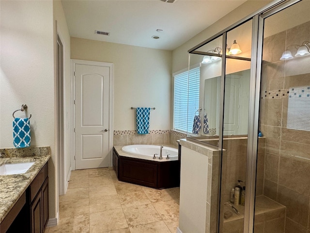 28423 Tanner Crossing Ln, Katy, TX 77494 - full bathroom featuring a stall shower, a garden tub, vanity, and tile patterned floors