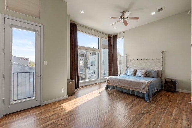 5122 Lillian St, Houston, TX 77007 - bedroom with access to outside, wood finished floors, recessed lighting, and a ceiling fan