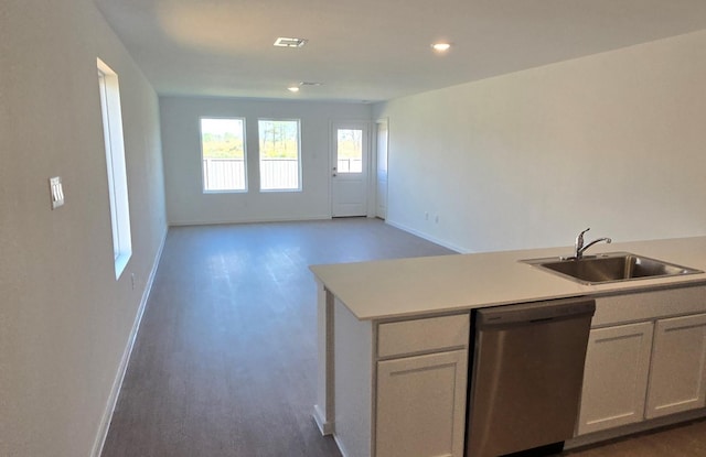 3005 Blue Gem Ct, Katy, TX 77493 - kitchen with dishwasher, light countertops, recessed lighting, open floor plan, and wood finished floors