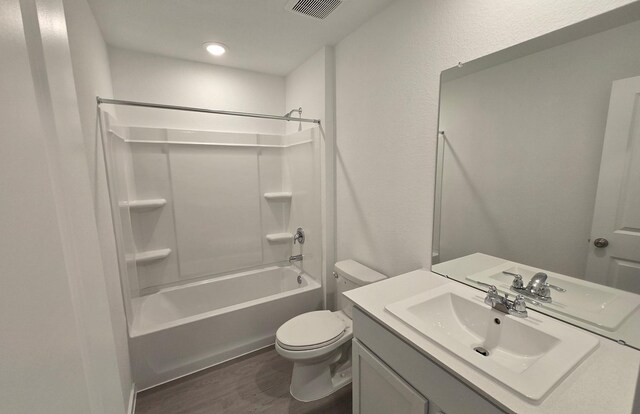3005 Blue Gem Ct, Katy, TX 77493 - bathroom with wood finished floors, vanity,  shower combination, and recessed lighting