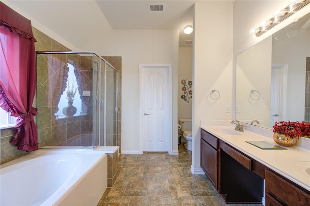 24514 Hikers Bend Dr, Katy, TX 77493 - bathroom featuring a stall shower, double vanity, a bath, and stone finish floors
