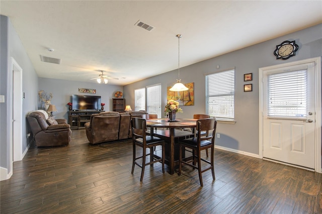 24514 Hikers Bend Dr, Katy, TX 77493 - dining space with a ceiling fan and dark wood-style floors