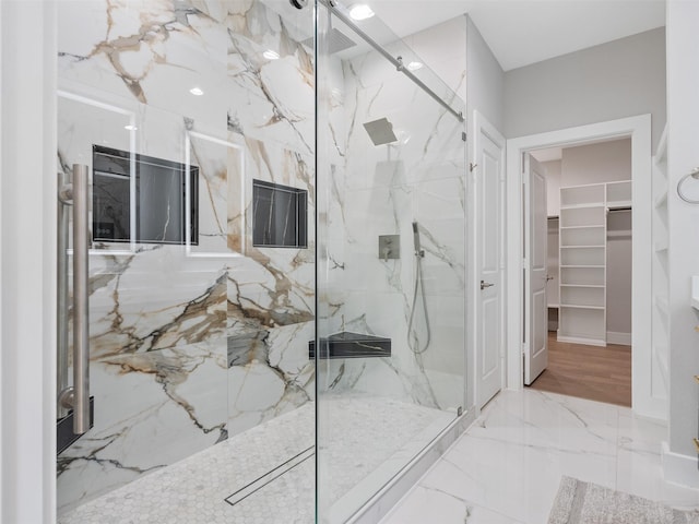 825 Paul Quinn St Unit E, Houston, TX 77091 - bathroom with a marble finish shower, a walk in closet, and marble tiled flooring