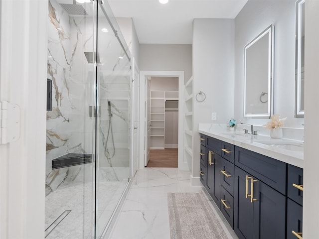 825 Paul Quinn St Unit E, Houston, TX 77091 - bathroom with a marble finish shower, marble tiled floors, double vanity, and a walk in closet