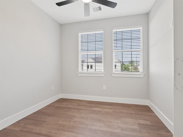 825 Paul Quinn St Unit E, Houston, TX 77091 - spare room with ceiling fan and wood finished floors