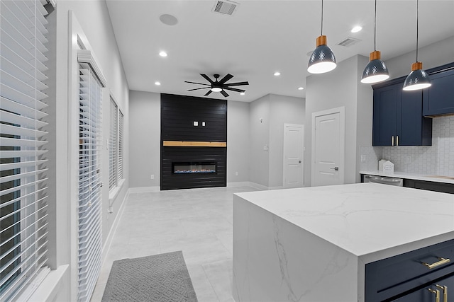 825 Paul Quinn St Unit E, Houston, TX 77091 - kitchen with recessed lighting, backsplash, a ceiling fan, blue cabinetry, and decorative light fixtures