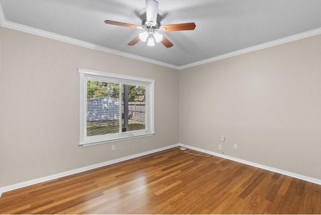 9110 Memorial Creek Dr, Spring, TX 77379 - empty room featuring wood finished floors, ceiling fan, and crown molding