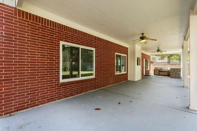 9110 Memorial Creek Dr, Spring, TX 77379 - view of patio with a ceiling fan and an outdoor kitchen