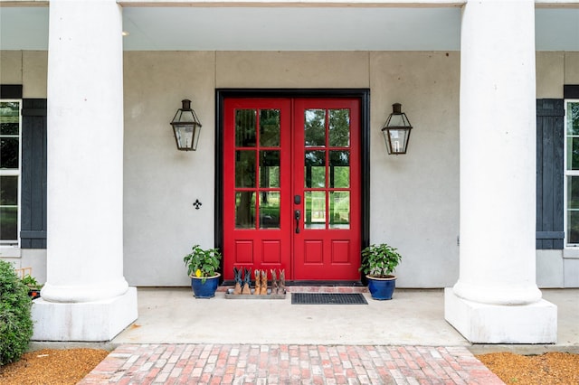 2790 Derby Ln, Madisonville, TX 77864 - entrance to property featuring french doors and stucco siding