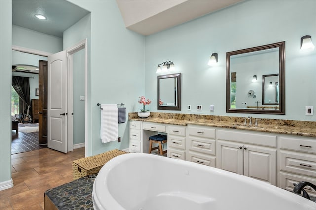 2790 Derby Ln, Madisonville, TX 77864 - full bathroom featuring a freestanding tub and vanity