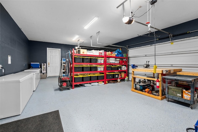 2790 Derby Ln, Madisonville, TX 77864 - garage with washer and dryer, refrigerator, and a garage door opener