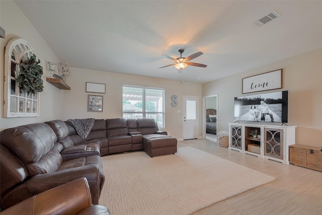 9119 Anna St, Needville, TX 77461 - living area featuring a ceiling fan and light wood finished floors