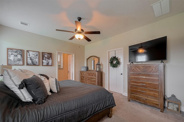 9119 Anna St, Needville, TX 77461 - bedroom with light colored carpet and ceiling fan