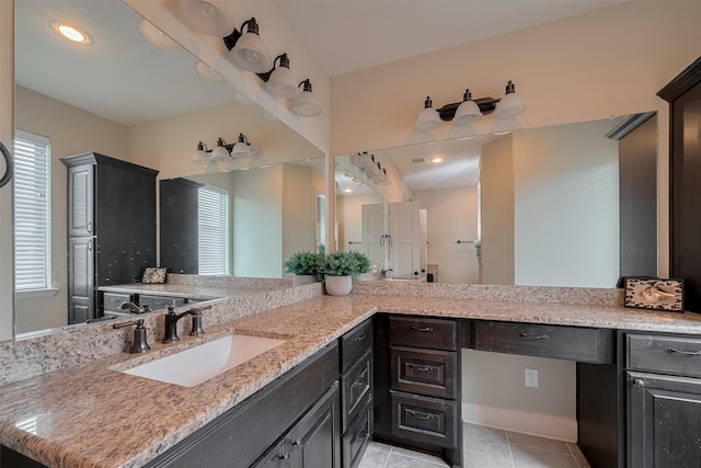 9119 Anna St, Needville, TX 77461 - bathroom featuring healthy amount of natural light, vanity, and tile patterned floors