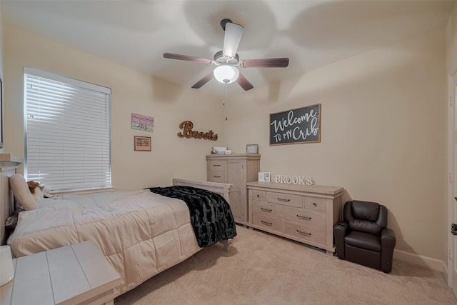 9119 Anna St, Needville, TX 77461 - bedroom featuring light colored carpet and a ceiling fan