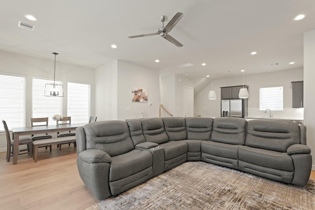709 Sienna Palm Ln, Houston, TX 77008 - living area with light wood finished floors, ceiling fan, and recessed lighting