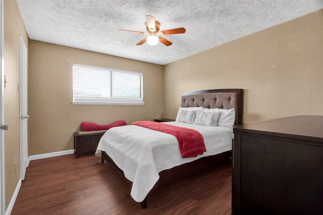 21426 Park York Dr, Katy, TX 77450 - bedroom with dark wood finished floors, a textured ceiling, and ceiling fan