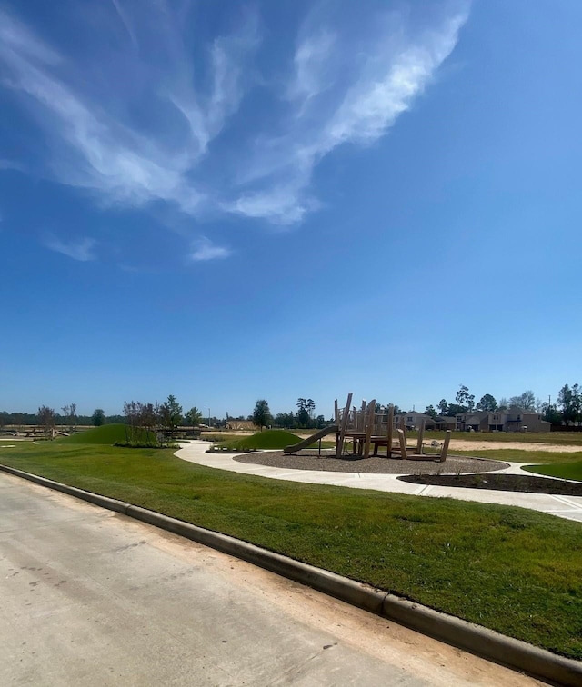 14842 Ash Landing Dr, Conroe, TX 77302 - view of home's community featuring a yard
