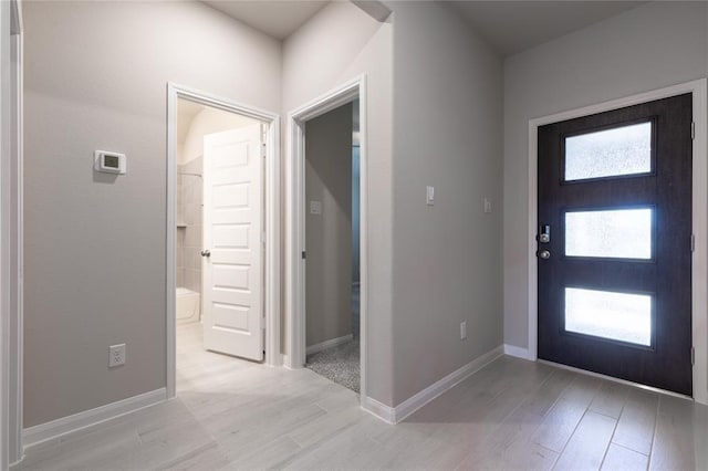 1202 Oak Barrel Run, Richmond, TX 77406 - foyer with light wood finished floors and plenty of natural light